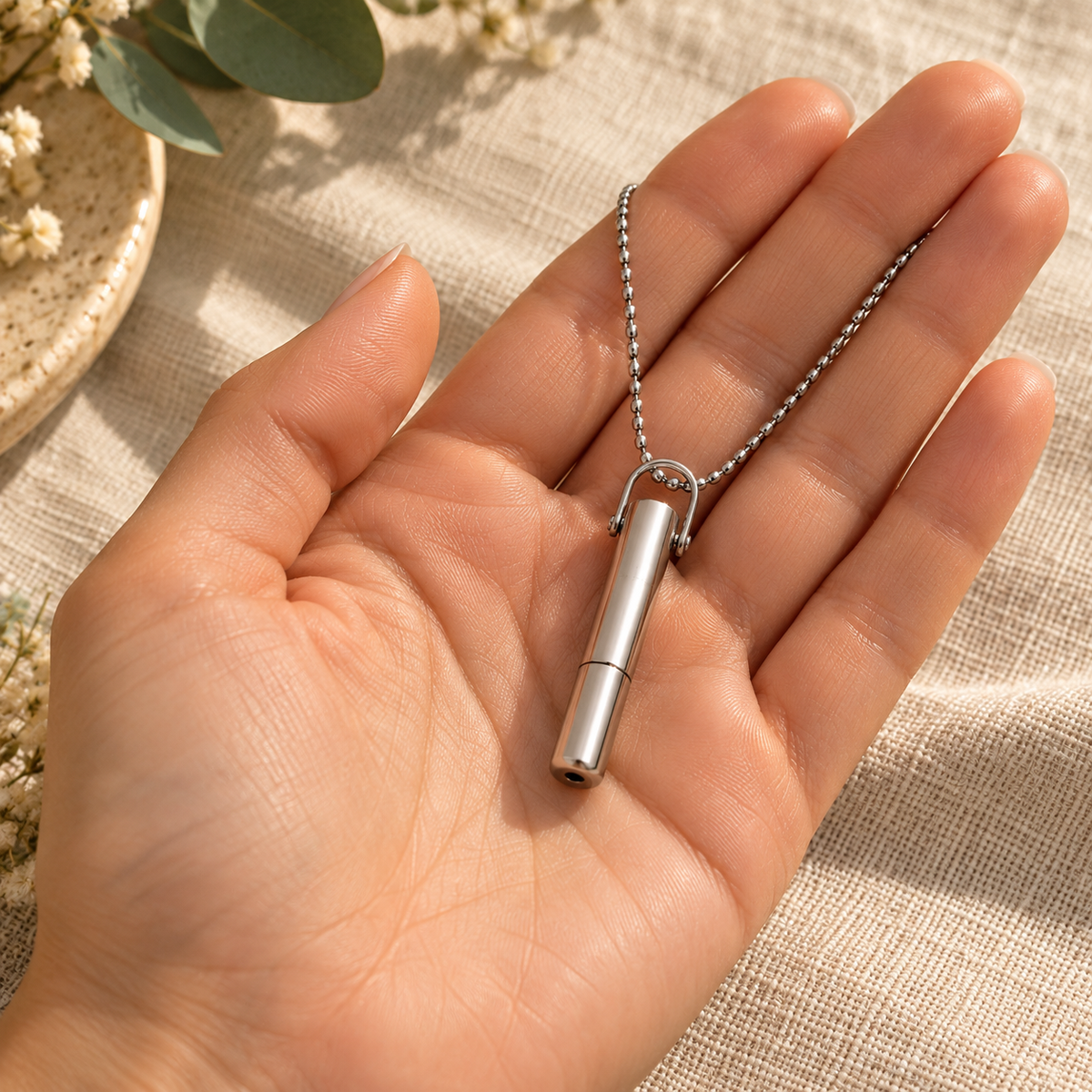 Pendentif ESPIRO dans la main